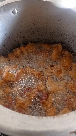 Frying Crispy Meat and Vegetables in Hot Oil