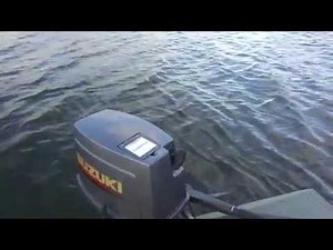 Suzuki 25 HP on 1448 Tracker Grizly.