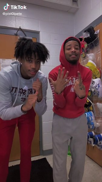 Coordinated Hand-Slapping Routine in Casual Attire