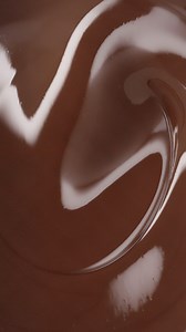 Vanilla cake and raspberry jam flavoured pieces meet Cadbury Dairy Milk. The Lamington Slice you love, now in a block. | Cadbury Dairy Milk