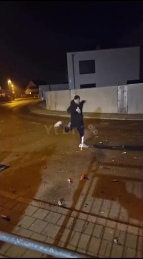 a man who is playing with firecrackers💥