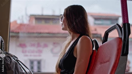 Female tourist using public bus for city exploration, sustainable transport and modern travel lifestyle