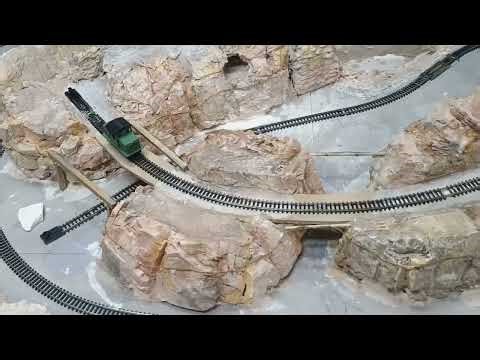 Mine train trolley track with auto reverse