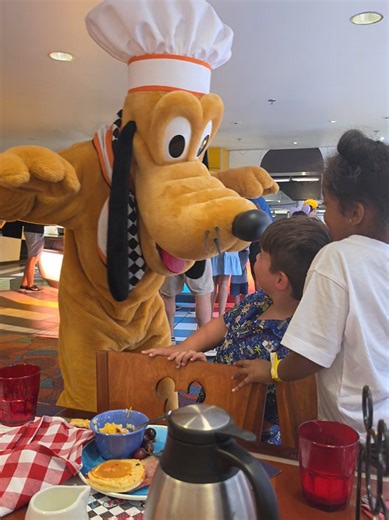 Chef Mickey’s Cute Moment with Pluto at Disney Orlando