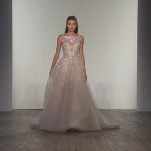 The NEW Lazaro collection is arriving in stores now! Find a retailer near you on our website. 💖 #LazaroBridal | Lazaro