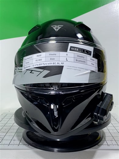 Helmet 174 is an SGI Tyro in glossy black Size L with Bluetooth (Earphones and micropohne), Backlight, Balaclava, Reflectors, Screen protector/Anti beading rain film, Anti fog film. Available on pay assistance: R400 when you collect amnd 5 weeks R300 and you are done.