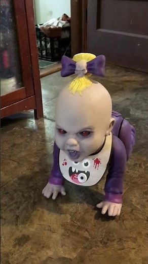 Spirit Halloween Crawling Claudette Zombie Baby