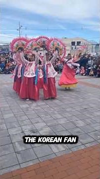 Experience the elegance of the Korean fan dance—a stunning cultural performance!