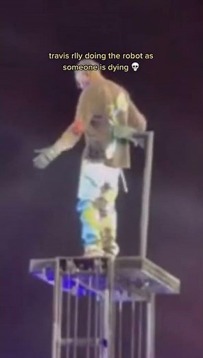 Travis Scott performs the robot as someone is dying