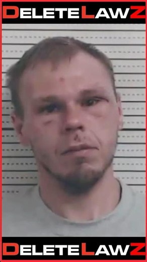 Cop abuses a man who is chained to a chair in jail!