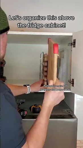 Organizing Above the Fridge Cabinet | Remodelaholic