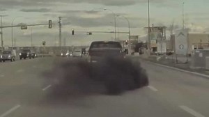 Watch Diesel Truck Block Road To Purposely Roll Coal On Tesla Model 3