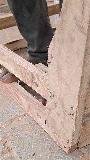 The correct way to hammer a nail into wood.