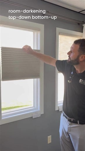 Our Design Consultant, Bryce, showing off the Enlightened Style honeycomb shades. 🤗 Some say "cellular shades", but either way they are stylish and energy-efficient, beautifully insulating your home while adding a modern, cozy touch. #HoneycombShades #cellularshades #roomdarkeningshades #lightfilteringshades #tomatoetomatoe 🤣 | Budget Blinds of Amherst, Sandusky and Wellington