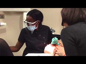 Dr Flora Chigwedere using dental hypnosis