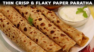 Friends, today I am sharing a Dhaba Style Aloo Paratha Recipe which is super thin & crisp, but flaky! Let's make Paper Paratha :) Atta - 1 cup Resultant Atta / Chalani Atta / R atta - 1 cup if R Atta is not available - use a combination of - 1 1/2 cup Atta, and 1/2 cup maida Salt - to taste Ghee - 1 tbsp Water - to make dough Boiled Aloo - 4 Onion - 1 Coriander Leaves - 2 tbsp Ginger - 1 inch Green Chilli - 2 Red Chilli Powder - 1 tsp Kasoori methi - 1 tsp Amchur powder - 1/2 tsp Black Salt - 1/