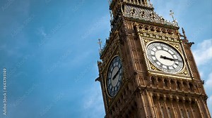 4K Time Lapse of Big Ben and moving Clouds During the Day with Copy Space: Capturing Daylight, Sunbeam Effects, and Iconic Architecture in London