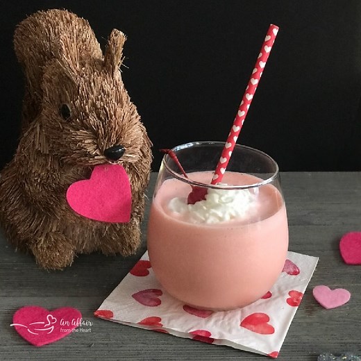 This retro Pink Squirrel Cocktail is made with vanilla ice cream, Crème de Cacao and Crème de Almond, garnished with a Maraschino cherry and whipped cream, for the cocktail that drinks like dessert! https://anaffairfromtheheart.com/pink-squirrel-cocktail/ | An Affair from the Heart