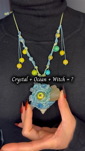 EEshells Witch Shop on Instagram: "Archive No. SF–005 · Aureflux Born where crystal veins meet ancient tides. Aureflux carries an irregular shell-crystal core, layered by the ocean itself— green fluorite for calm perception, yellow fluorite for focused will. Its eye is always open, not to judge, but to watch over rituals, dreams, and quiet moments between waves and spells. Still in its egg state, patiently waiting for the witch it chooses. Not every sea spirit seeks adoption— some wait to recogn