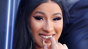 Cardi B reacts to her wardrobe malfunction at the Billboard Music Awards. | Hollywood Life