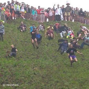 6.1M views · 15K reactions | These wipeouts from the Gloucestershire Cheese Rolling Championships are brutal  | VT | Facebook