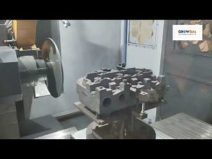 Tractor cylinder head fettling on 4 axis machine