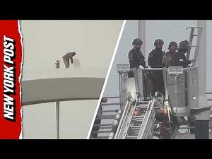 Protester Climbs Down DC Bridge After Five Days