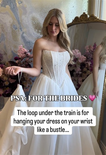 PSA for the brides 💗 Raise your hand if you thought that loop under your train was meant to be a wrist strap 🙋‍♀️😂 No judgment, we’ve all been there. So what is it actually for? That loop is designed to hook your train onto the gown itself, helping protect its shape and keep it looking beautiful while in storage ✨ Tag a bride or your bridal bestie who needs to know this 🤍 #blushbridalcouture #2026bride #blushbride #weddingdresstips #bridaltips @Essense of Australia