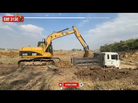 Caterpillar 313C Excavator Loading Trucks - Pyramis Ate