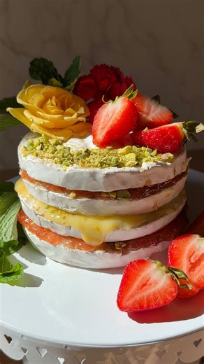 1.4M views · 1.7K reactions | Layered Brie Cheesecake — a fun twist on a cheese board! It's topped with fresh fruit, honey, nuts and served with savory crackers. This jam-layered Brie cake is beautiful, ideal for entertaining, and takes minutes to make! Britt Williams | Tasty | Facebook