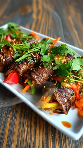 Thinly-sliced American Wagyu, quickly seared and glazed with a refined take on Korean BBQ. Finished with crisp vegetables and just enough heat to complement the richness of the beef. Recreate your own with the full recipe. 👉 https://bit.ly/3FPttaI #ImperialWagyu #AmericanWagyu #ExcellenceElevated | Imperial Wagyu Beef