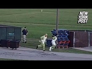 Two inmates dart past guard in successful prison escape