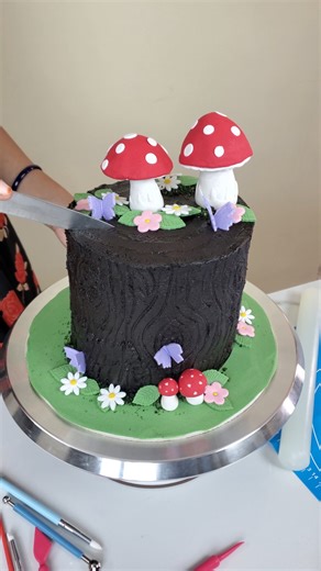 DoughOfDreams on Instagram: "Nature Theme Trunk Cake | Simple Yet Special 🌳🍰 n this video, I show how I made this nature theme trunk cake. I used simple dark choclate to create a cake that looks like a tree trunk. If you liked this video, please like, share, and Follow for more creative cake videos ❤️🎂 #naturecake #trunkcake #treecake #forestcake #woodtexturecake #mushroomcake #themedcake #natureinspired #buttercreamart #reels #reelsinstagram #instareels #reelsvideo #viralreels #trendingreels