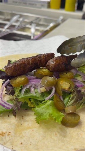 You think it’s “just a wrap” until that first bite hits 😮‍💨❌ (nah… THIS is the one) 😮‍🔥🌯 Our Kufta Kebab Wrap is built like a meal—not a snack 🤝🔥 Smoky, juicy kufta crunchy veggies pickles that wake it up 🥒🌶️✨ Rolled tight, pressed hot, and packed so every bite tastes like the “best part” 😮‍🔥💥 If you’re hungry-hungry… don’t play with it 😅🍽️ Pull up to Torshi - Mediterranean Grill or order ahead and secure yours 📲🚗💨 #TorshiGrill #KearnyNJ #MediterraneanFood #KuftaKebab #WrapLover