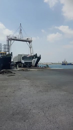 Loading Containers with Crane at Industrial Port