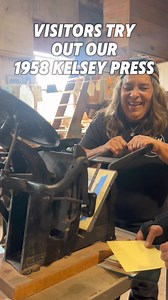 Visitors trying out our 1958 Kelsey Press, quickly find out how much strength is required to operate it! | Blue Ox Millworks