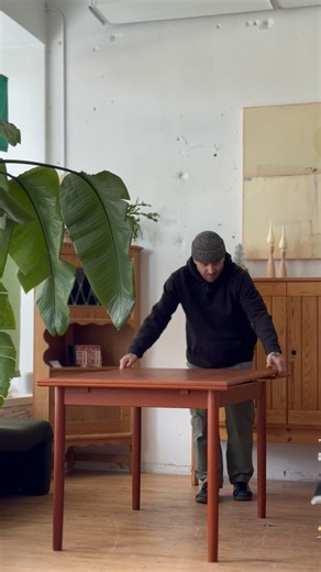 This fully restored Danish teak draw-leaf dining table beautifully balances modern function with vintage charm. Crafted in warm, richly grained teak, the table features smooth pull-out leaves on each end, allowing you to expand the surface effortlessly for gatherings or extra workspace. The restoration highlights the natural luster of the wood while preserving the character and craftsmanship of the original piece. A timeless example of Danish design—both elegant and practical—perfect for everyda