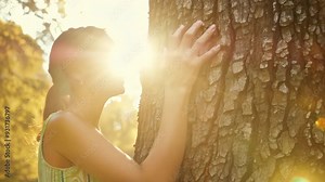 Human hug tree trunk. People and nature connection concept. Beautiful green forest. Nature environment. Woman care about ecology. Save planet. Wood bark close up. Peace, love and harmony at eco park.