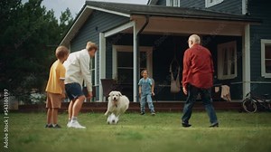 Grandfather Playing Ball with His Son and Grandchildren. Family Members Spending Leisure Time Outside with Kids and Pet Dog. People Throwing the Ball Between Each Other, Having Fun in Their Front Yard