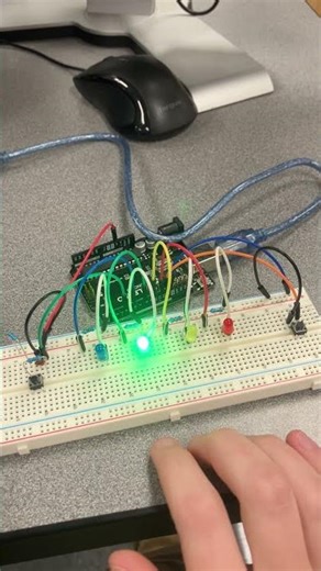 Internal pull up resistor. Push left button lights flash from left to right, push right button flops