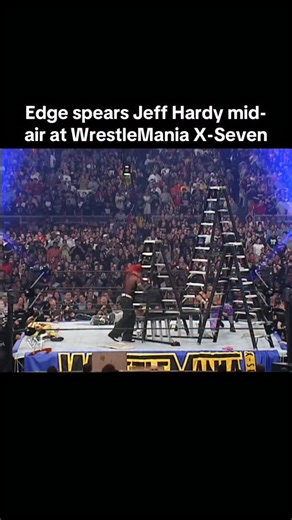 WrestleTaps on Instagram: "At WrestleMania X-Seven on April 1, 2001, Edge soared off a ladder to spear Jeff Hardy mid-air as Hardy hung from the tag team titles in the TLC match."