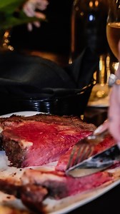 23 reactions | It’s Prime Rib Tuesday! Juicy prime rib served with au jus and horseradish, paired with a fully loaded baked potato — bacon, cheese, butter, sour cream, and green onions — dressed table side for that perfect finish. #primerib #food #restaurant #dinein #fyp #explore | Benchmark American Brasserie | Facebook