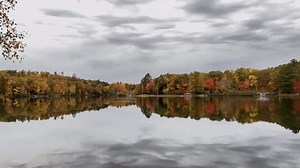 Stunning Fall Foliage Reflects in Wisconsin Bay as Colors Reach Peak