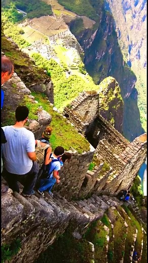 The “Stair of Death” in Peru, built by the Inca civilization 600 years ago, leads to the top of Mount Huayna Picchu, which stands at a height of over 8,850 feet, where the Incas built temples and terraces. | Historical Archaeology