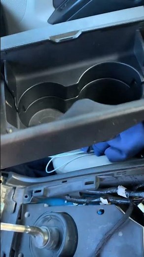 How to remove a 2010 Ford Mustang Center Console and Air Bag Module.