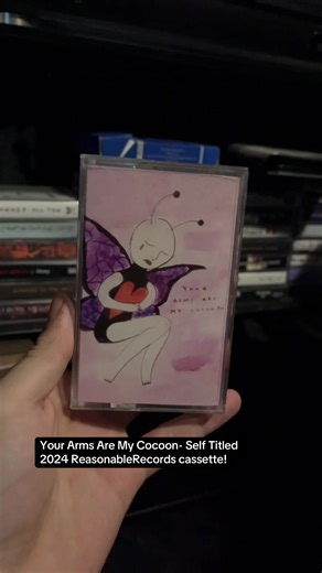 Your Arms Are My Cocoon- Self titled 2024 brown swirly Cassette released by @Reasonable Records ! super limited to 50 (each variant) Song- “Metamorphosis” this one means a lot to me and since yall liked the death of a rabbit video so much here is self titled super lucky to have one of these i remember trying to buy the purple color and it sold out in my cart 🫩 immediately snagged one of these though #yourarmsaremycocoon #emo #screamo #cassette #electronic
