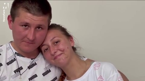 Ukrainian bride who lost legs in landmine blast shares first dance in hospital