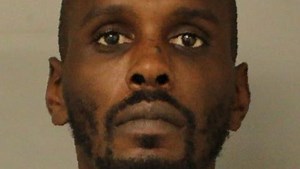 Undercover cop who killed bystander testifies at robber's murder trial