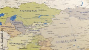 Atlas map of the world globe spinning zooming in and focusing on the country of Ukraine, Ukrainian. Showing area, motion video stock in HD and 4K