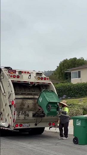 Rear load garbage truck on green waste #garbagecan #garbagetruck #greenery